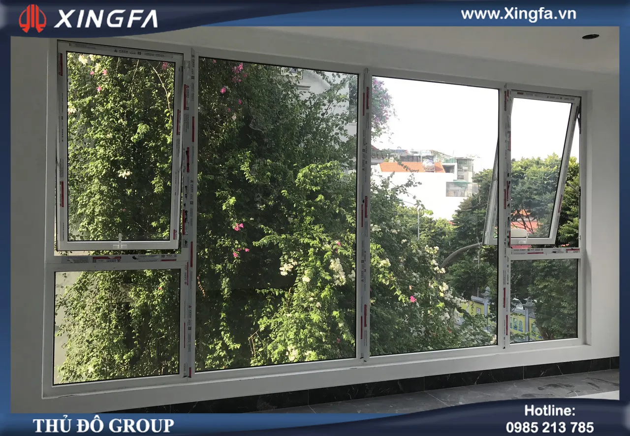 Sự kết hợp tuyệt vời giữa nhôm Xingfa vân gỗ với kính an toàn màu xanh nước biển của Hải Long